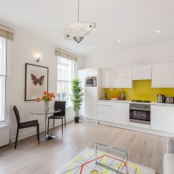 living area with kitchen, Crawford Apartments, Marylebone, London W1