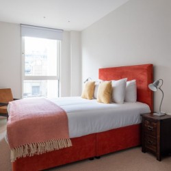 bedroom with side table and wardrobe, Victoria Apartments, Victoria, London SW1