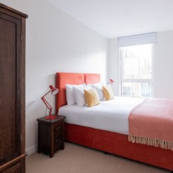 bedroom and wood wardrobe, Victoria Apartments, Victoria, London SW1