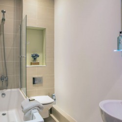 bathroom with shower and bathtub, Park Road Apartments, Finchley, London N3