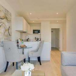 living area with dining table and kitchen, Court Apartments, Kings Cross, London N1