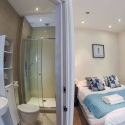 bedroom and shower room, Park Road Apartments, Finchley, London N3