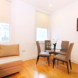 sofa and dining area, Evelyn Apartments, Fitzrovia, London W1