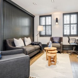 living room with sofa, chairs, tables and work desk, Garrick Apartments, Covent Garden, London WC2