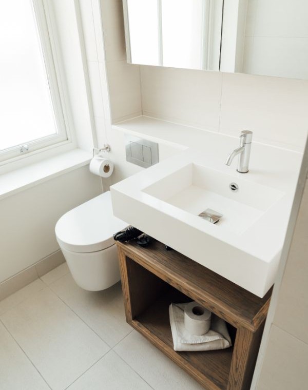 bathroom with toilet, sink and mirror, Wigmore Street Apartments, Marylebone, London W1