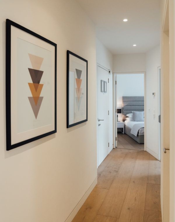 hallway with artwork, Wigmore Street Apartments, Marylebone, London W1