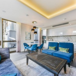 living area with sofa, blue chairs, dining area and kitchen, Holland Park Apartments, Kensington, London W14
