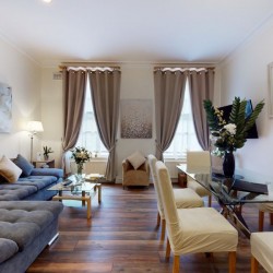 living room with sofa and dining area, Chesterfield Apartments, Mayfair, London W1