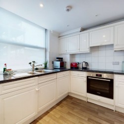 white kitchen with equipment and tools, Bond Street Apartments, Mayfair, London W1