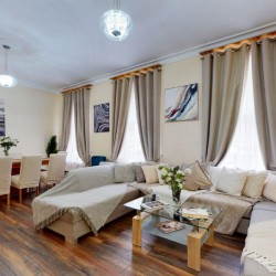 living room, large sofa with pillows, dining area, Chesterfield Apartments, Mayfair, London W1