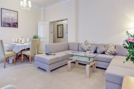 living room with corner sofa and dining area, Chesterfield Apartments, Mayfair, London W1