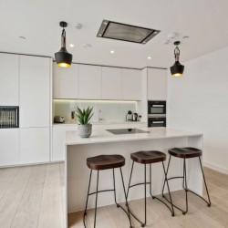modern kitchen with breakfast bar, stools and roof lamps, The Residences, Southwark, London SE1