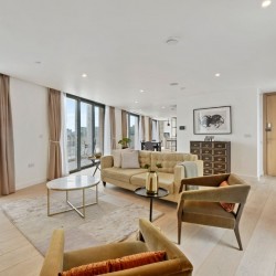 large living room with chairs, sofa, drawers, and view to balcony, The Residences, Southwark, London SE1
