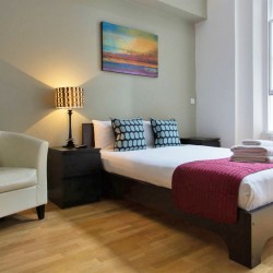 double bed and chair, Bayswater Apartments, Bayswater, London, W2