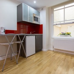 kitchenette with fridge and breakfast bar, Bayswater Apartments, Bayswater, London, W2