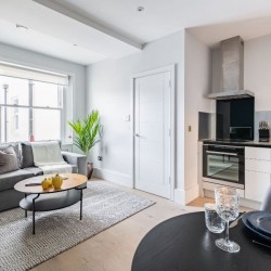 living room with sofa, kitchen and dining area, Kensington Apartments, Kensington, London SW7