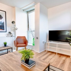 living room with smart tv and coffee table, Drury Lane Apartment, Covent Garden, London WC2