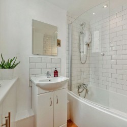bathroom with shower over bathtub, Seven Dials Apartment, Covent Garden, London WC2