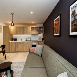 living area with dining table and kitchen, Paddington Apart Hotel, Paddington, London W2