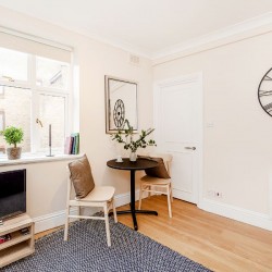dining table and smart tv in living room, Seven Dials Apartment, Covent Garden, London WC2