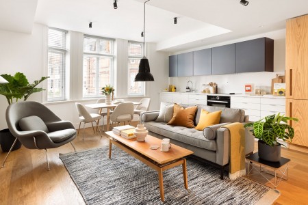 studio living room with sofa, dining table and kitchen, Mar Apartments, Marylebone, London W1