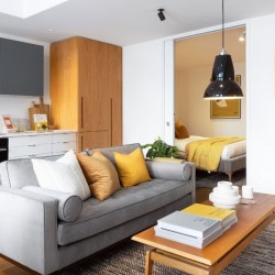 living room with sofa, kitchen and bedroom, Mar Apartments, Marylebone, London W1