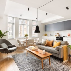 open plan living area with dining table and kitchen, Mar Apartments, Marylebone, London W1