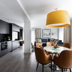 living area with kitchen, sofa and dining area, The Luxury Apartments, Knightsbridge, London SW3