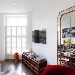 large mirror, trunk side table and TV, Primrose Hill Apartment, Primrose Hill, London NW3