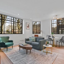 large living room with TV, chair, small table, sofa, work desk and dining table with chairs, Fitzrovia Serviced Apartments, Fitzrovia, London W1