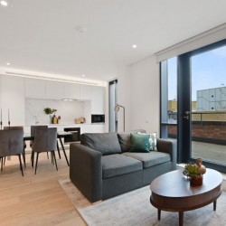living room with coffee table, sofa, large balcony, dining table and kitchen, Fitzrovia Serviced Apartments, Fitzrovia, London W1