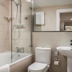 bathroom with bathtub, toilet, wash basin,Kensington High Street, Kensington, London W8