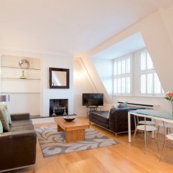living room with 2 leather sofas, dining table, coffee table and flat screen tv, Barrett Apartment, Marylebone, London W1