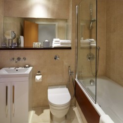 modern bathroom with sink, toilet, mirror and bathtub, South Kensington Luxury, Kensington, London SW7