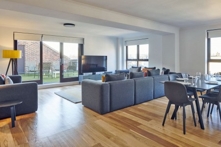 large living room with wood floors, sofas, tv and balcony, Kensington High Street, Kensington, London W8