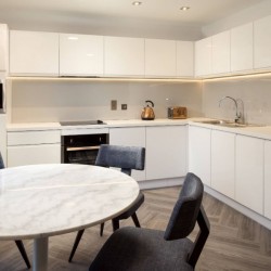 large kitchen for self-catering and dining table, Stratford Apartment Hotel, Stratford, London E15