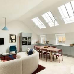 living room with large sofa, dining table and open plan kitchen, 3-Bedroom Penthouse, Marylebone, London W1