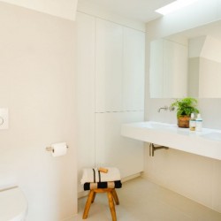 bathroom with wc, stool and double sink, 3-Bedroom Penthouse, Marylebone, London W1