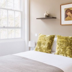 bedroom with bright pillows, Hampstead Apartments, Hampstead, London NW3