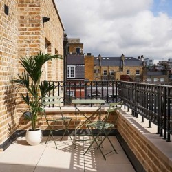 large balcony with plant and table, Portland Apartments, Marylebone, London W1