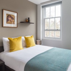 double bedroom with large windows, Hampstead Apartments, Hampstead, London NW3