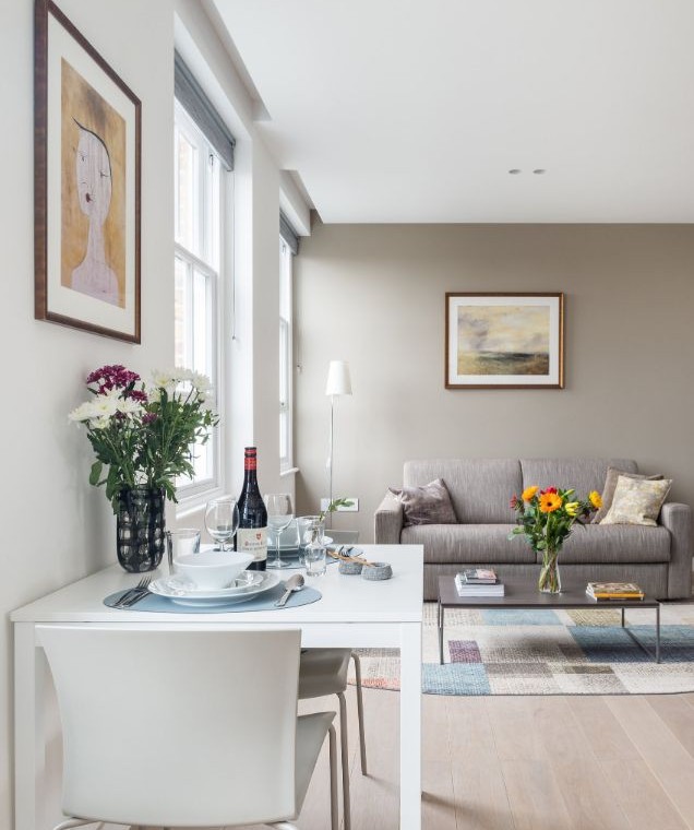 dressed dining table, sofa and table with flowers, Hampstead Apartments, Hampstead, London NW3