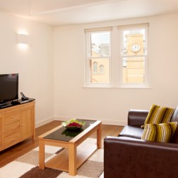 sofa, coffee table, side table with tv,Liverpool Street Apartments, City, London EC2