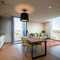 large penthouse with kitchen, dining table and sofa, Mornington Crescent, Camden, London NW1