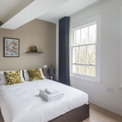 double bedroom with large windows, Hampstead Apartments, Hampstead, London NW3