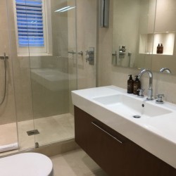 bathroom with shower, toilet, sink and mirror, Hyde Park Penthouse, Kensington, London SW7
