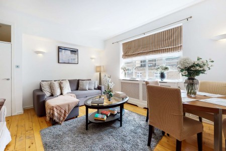 living room with wood floors, coffee table, sofa and dining area, Grosvenor Square Apartments, Mayfair, London W1