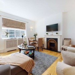 living room with sofa bed, table, dining area and tv, Grosvenor Square Apartments, Mayfair, London W1