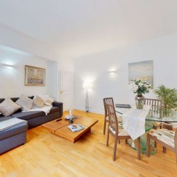 living room with sofa bed, wooden floors and dining area, Grosvenor Square Apartments, Mayfair, London W1