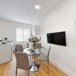 dining area, tv and kitchen, St James's Apartments, Mayfair, London SW1